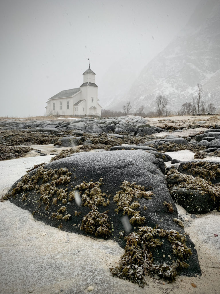 Church seaside with ocean rocks