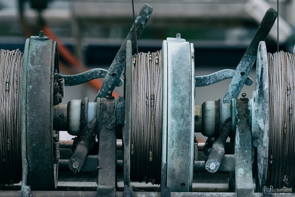 commercial fishing reels on a boat