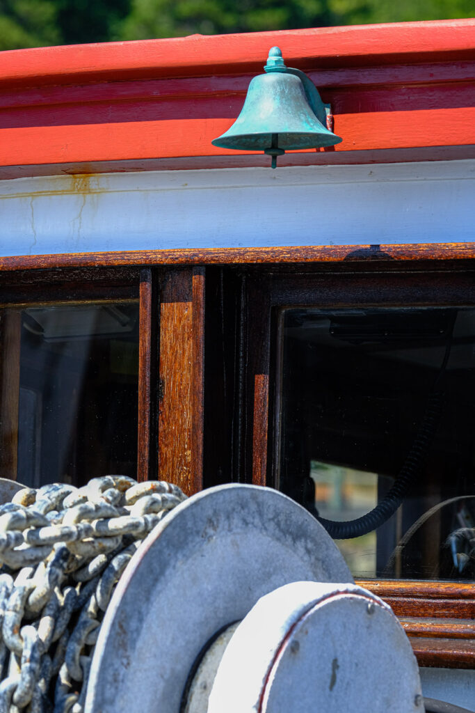 Ships bell and anchor chain on a fishing boat