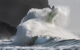 Waves in the ocean creating unique abstract shapes