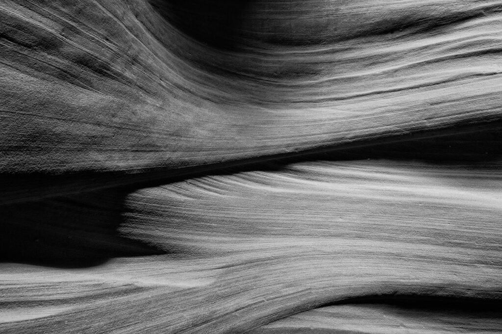 monochrome picture of curved sandstone