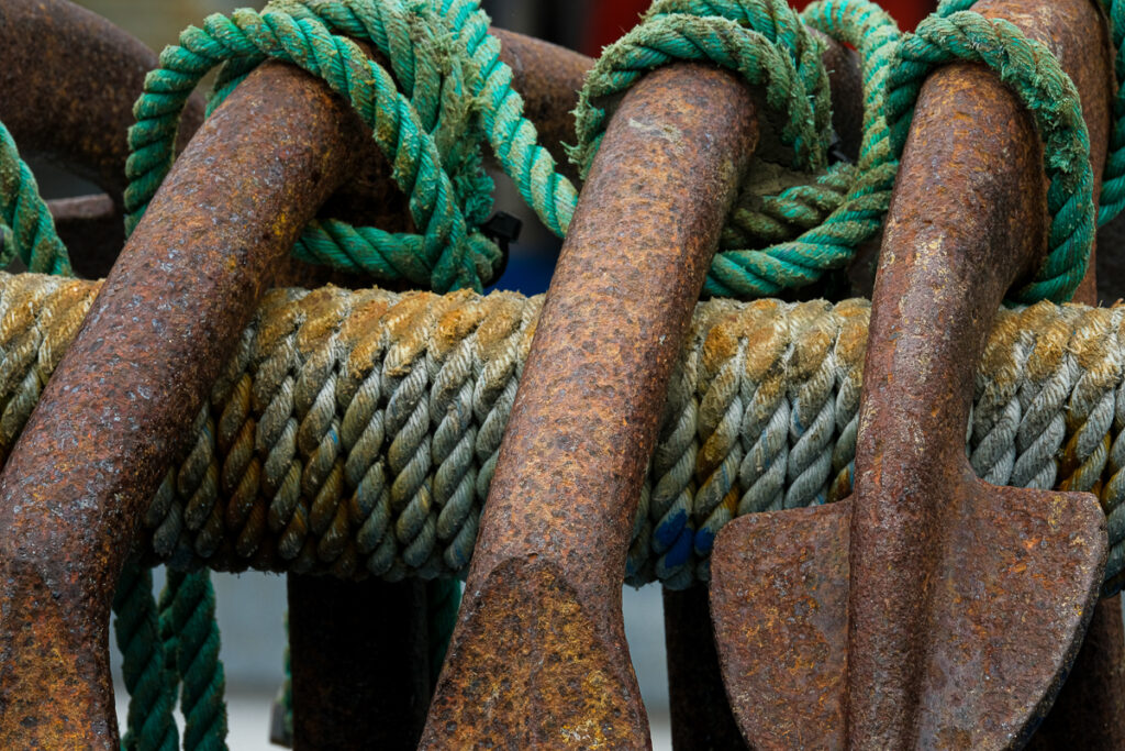 rusty hooks and rope on a crabbing boat in Newport Oregon