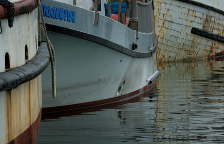 3 boats tied up at the pier in Newport Oregon