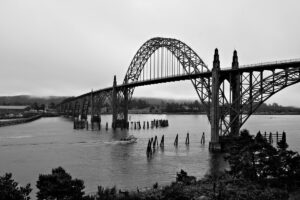 Photograph of the Yaquina Bay Bridge in Newport Oregon on a cloudy day.