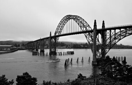 Photograph of the Yaquina Bay Bridge in Newport Oregon on a cloudy day.