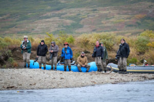 A group of photographers in alaska with rafts