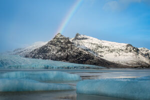 Photograph of a mountain and rainbow in Iceland