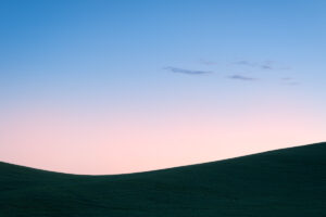 Photograph of sunrise over wheat fields in Palouse Washington