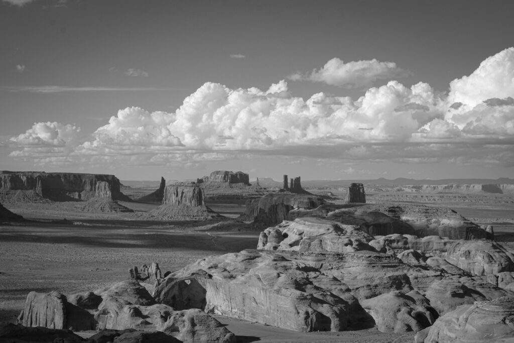 A black and white image of monument valley