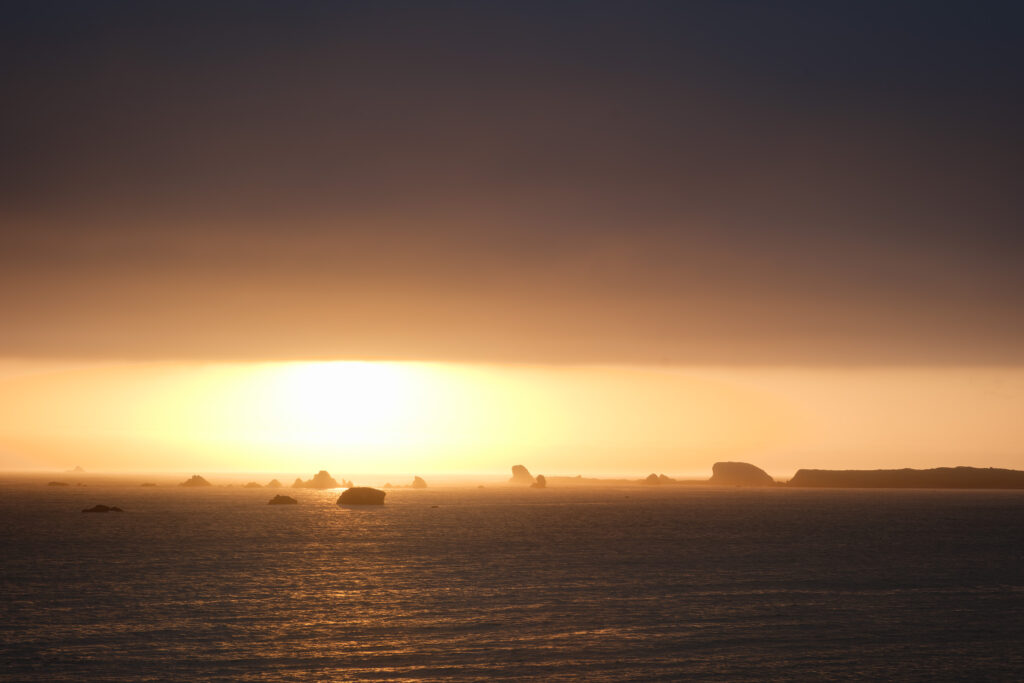 A fog layer during sunset near crescent city california